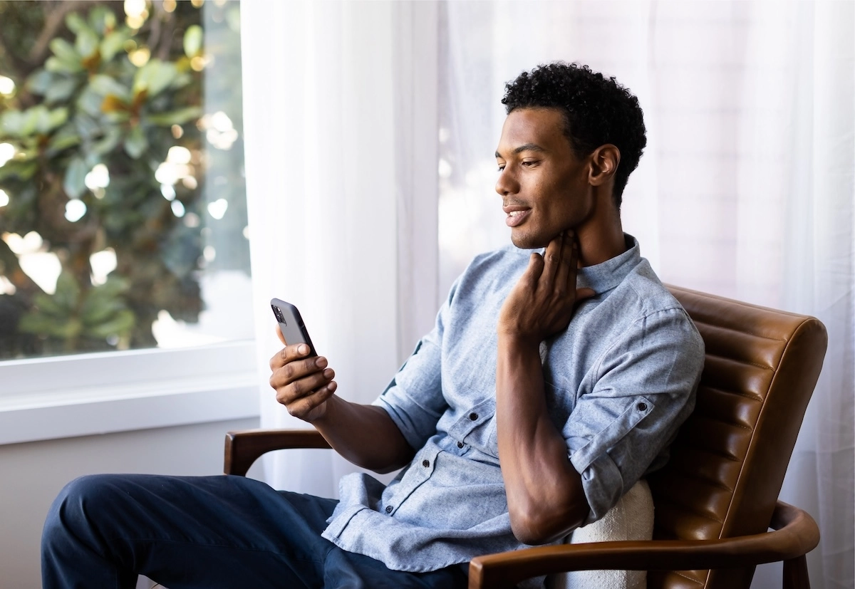 young man taking a virtual doctor visit