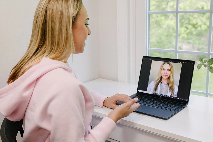 woman taking a virtual therapy visit